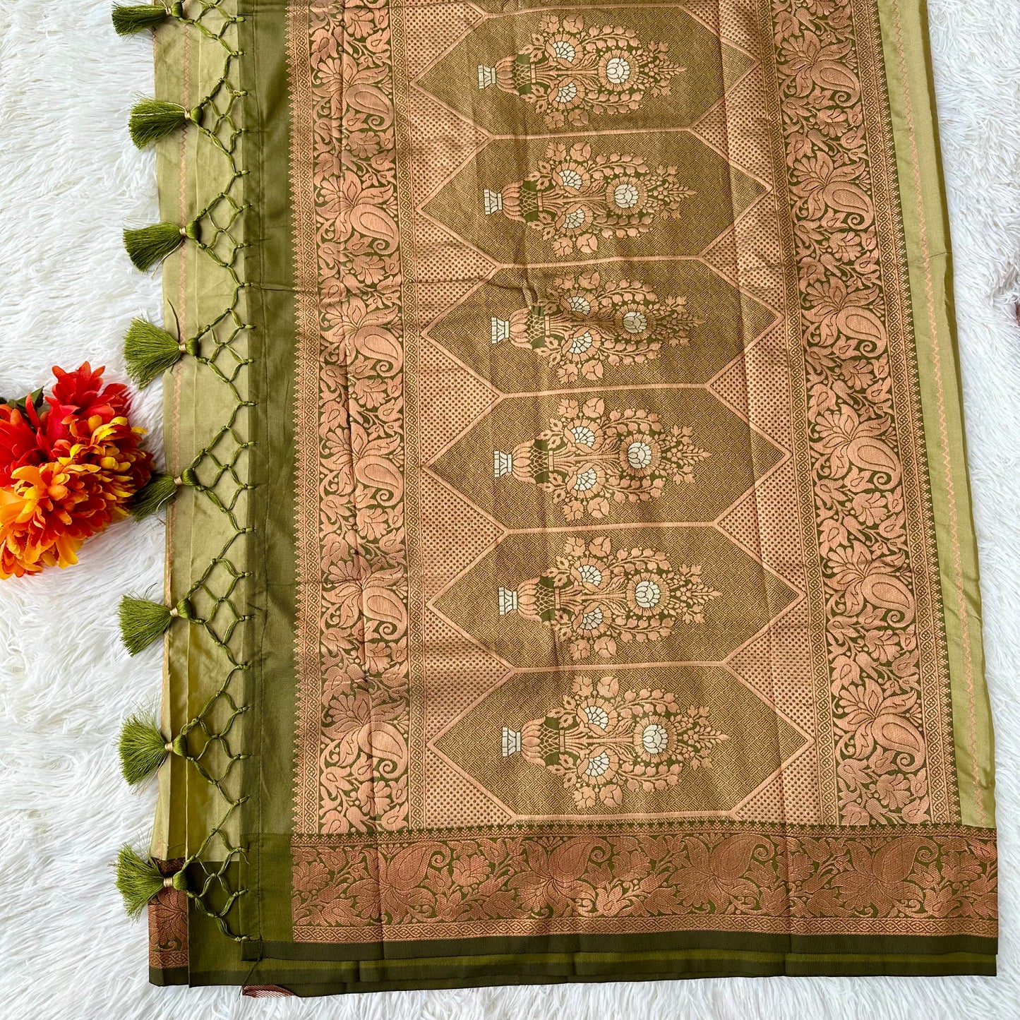 The Natural Beauty Olive Green Color Saree With The Rich Copper Zari border