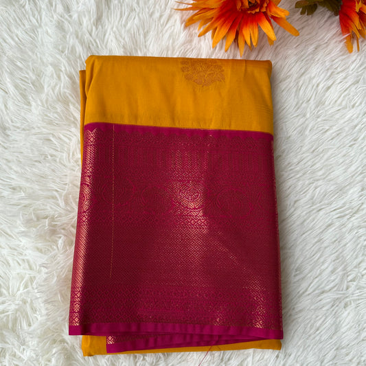 Radiant Grace: Yellow Semi Silk Saree with Pink Border, Embracing Tradition