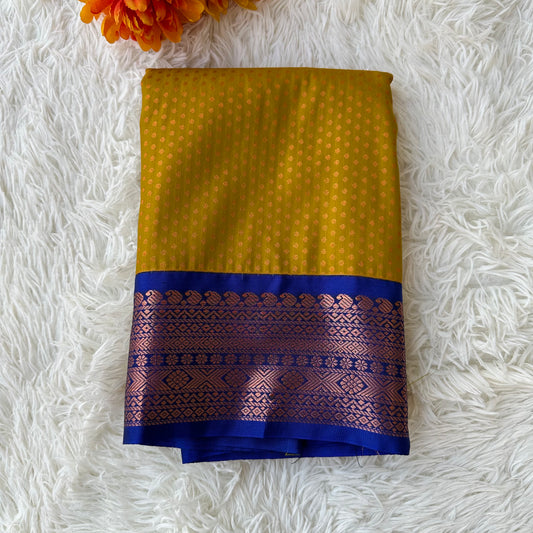 The Creamy Butterscotch Yellow Semi Silk Saree With Navy Blue Border