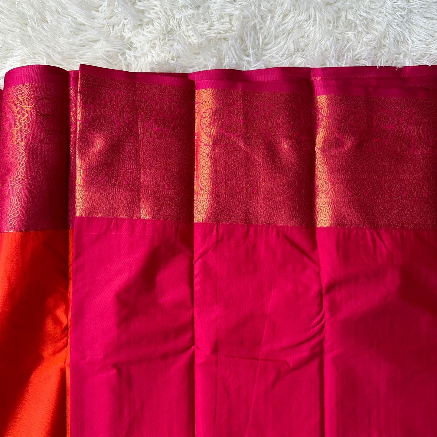 The Bold Elegance Red Orange Semi Soft Silk Saree With Rani Pink Border
